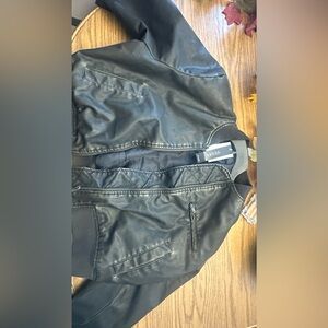 Black Leather Jacket with Casual Style and Weather-Resistant Material